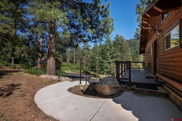 9 Los Ranchitos Dr, Durango, CO 81301 - view of patio / terrace with a deck and a view of trees