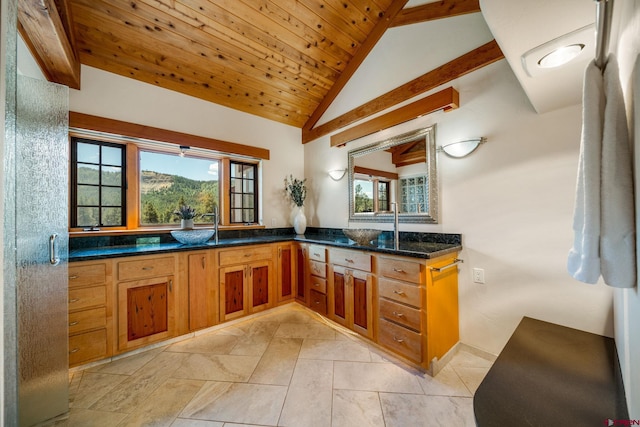 2415 Echo Canyon Ranch Ln, Pagosa Springs, CO 81147 - full bathroom with double vanity, vaulted ceiling, and wooden ceiling