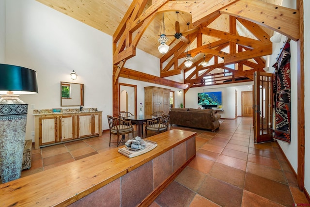 2415 Echo Canyon Ranch Ln, Pagosa Springs, CO 81147 - living area with high vaulted ceiling and a wooden ceiling with exposed beams