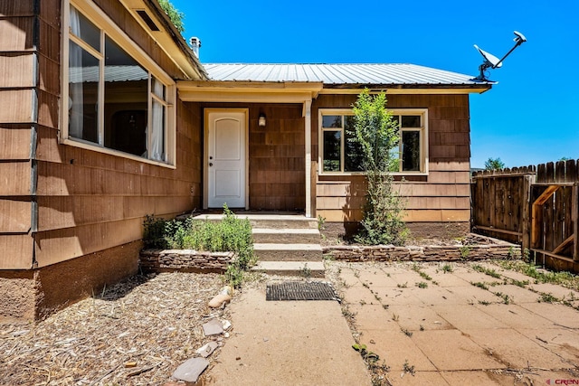 111 E 31st St, Durango, CO 81301 - entrance to property featuring a metal roof and a patio