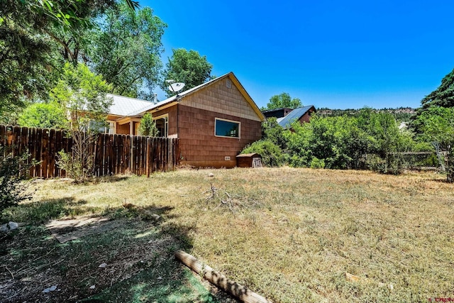 111 E 31st St, Durango, CO 81301 - view of side of property with a metal roof