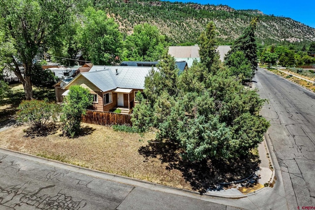 111 E 31st St, Durango, CO 81301 - view from above of property with a mountainous background and a heavily wooded area