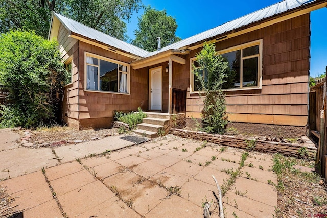 111 E 31st St, Durango, CO 81301 - view of front of home featuring a patio area and a metal roof