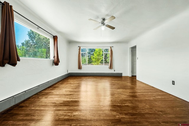 111 E 31st St, Durango, CO 81301 - spare room with a ceiling fan, a baseboard heating unit, and wood finished floors