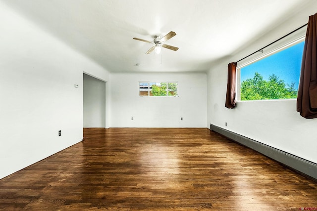 111 E 31st St, Durango, CO 81301 - unfurnished room with baseboard heating, a ceiling fan, wood finished floors, and healthy amount of natural light