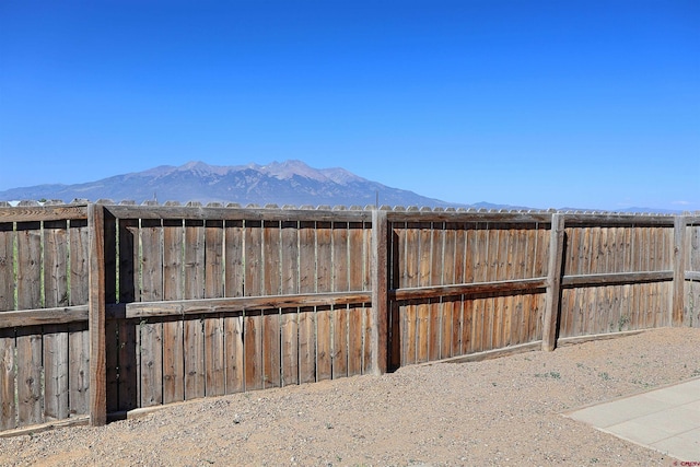19029 Country Dr, Alamosa, CO 81101 - view of yard with a mountain view