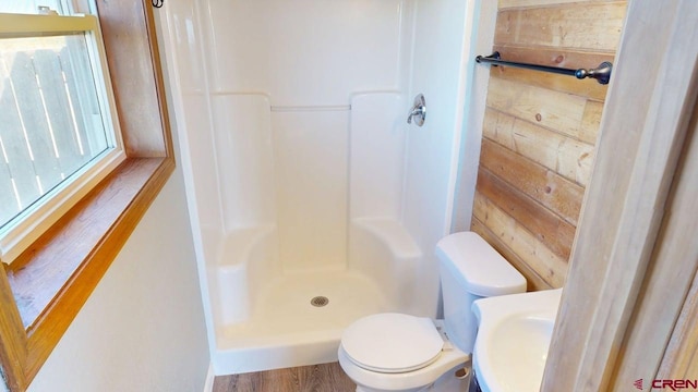19029 Country Dr, Alamosa, CO 81101 - full bathroom with a shower stall and wood finished floors
