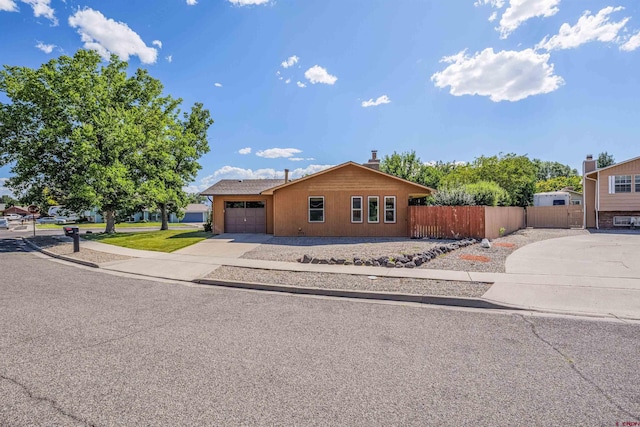 2909 Pheasant Run St, Grand Junction, CO 81506 - single story home featuring driveway and a garage