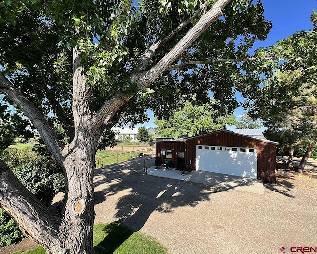 18173 Rd 22, Cortez, CO 81321 - detached garage with asphalt driveway
