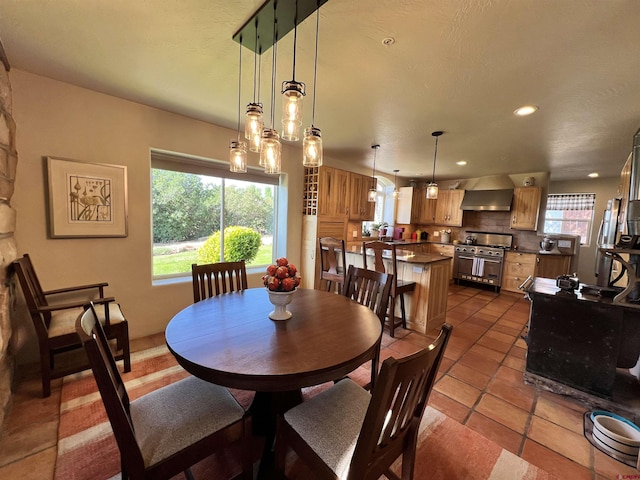 18173 Rd 22, Cortez, CO 81321 - dining room with dark tile patterned floors and recessed lighting