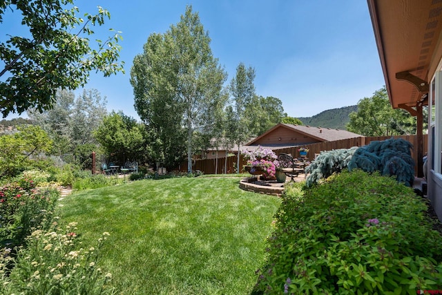 21 Tierra Verde Dr, Durango, CO 81301 - fenced backyard featuring a mountain view