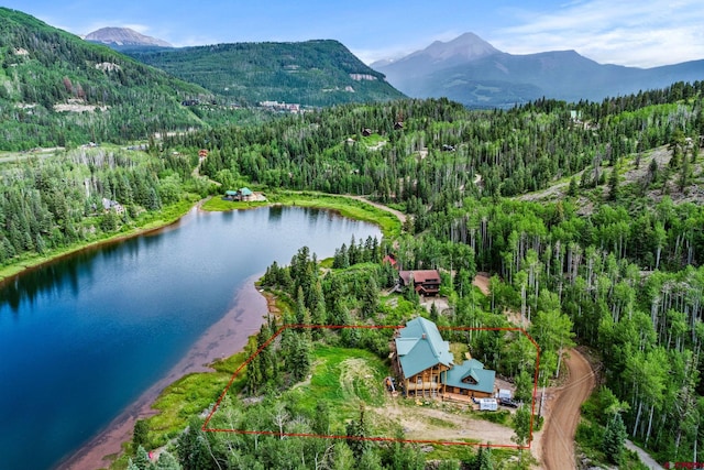 580 Lake Purgatory Dr, Durango, CO 81301 - aerial overview of property's location with property parcel outlined and a water and mountain view