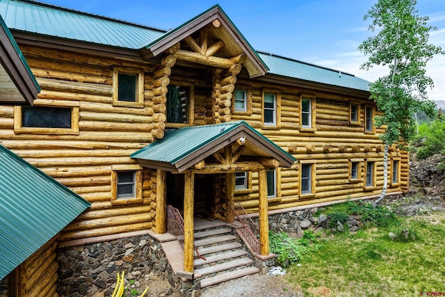 580 Lake Purgatory Dr, Durango, CO 81301 - log-style house featuring log exterior and a metal roof