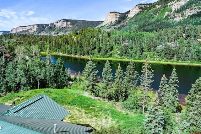 580 Lake Purgatory Dr, Durango, CO 81301 - view of mountain background featuring a nearby body of water and a heavily wooded area