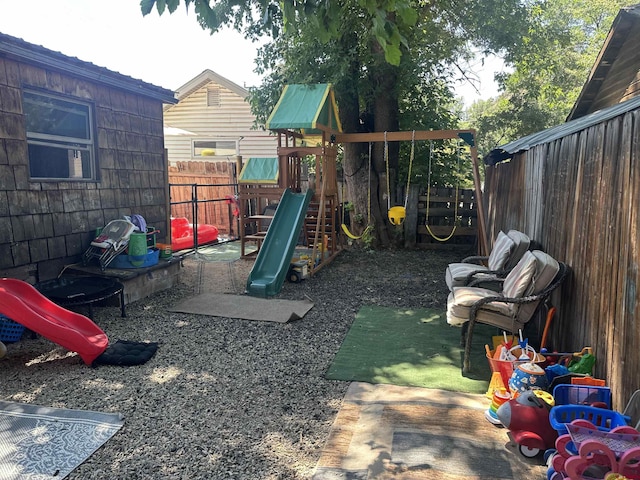 209-211 Railroad Ave, Dolores, CO 81323 - view of jungle gym featuring a fenced backyard