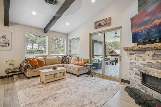 791 Antelope Ave, Pagosa Springs, CO 81147 - living area with a stone fireplace, plenty of natural light, wood finished floors, and recessed lighting