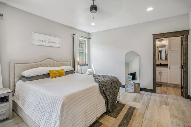 791 Antelope Ave, Pagosa Springs, CO 81147 - bedroom featuring light wood finished floors, recessed lighting, connected bathroom, and a ceiling fan
