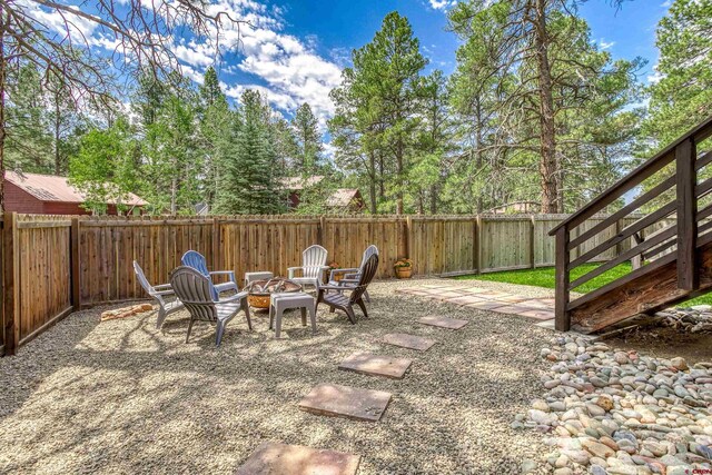 791 Antelope Ave, Pagosa Springs, CO 81147 - fenced backyard with a fire pit