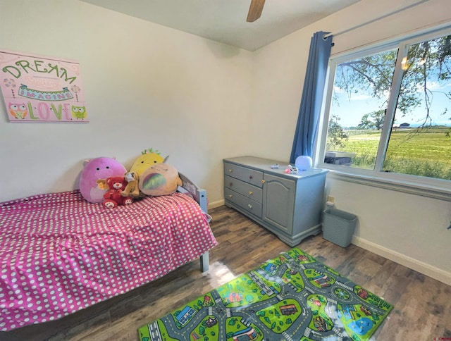 22548 M Rd, Cortez, CO 81321 - bedroom featuring wood finished floors and ceiling fan