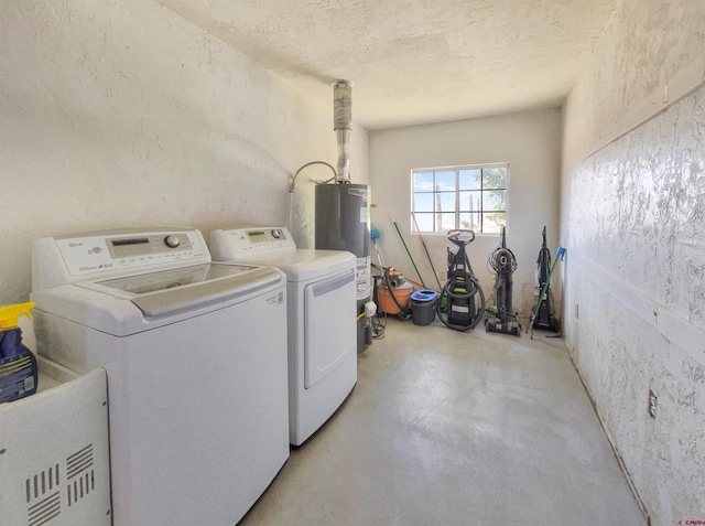 22548 M Rd, Cortez, CO 81321 - laundry area featuring gas water heater and washing machine and clothes dryer