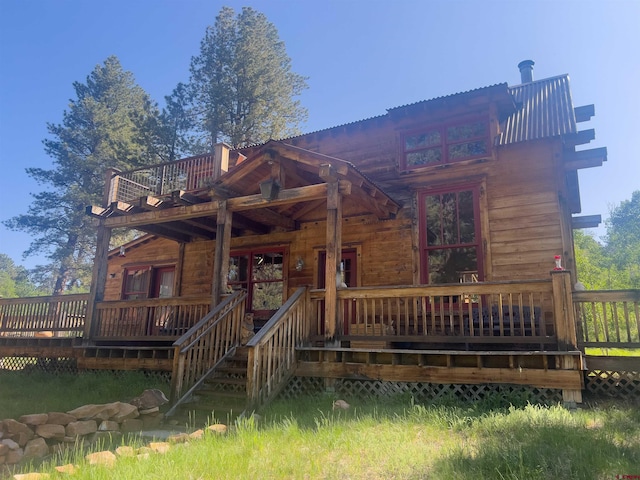 515 Bristol Rd, Placerville, CO 81430 - back of house featuring a wooden deck