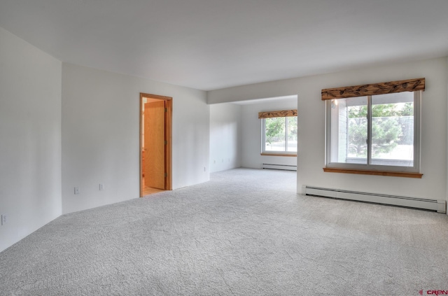 678 N Lakeside Dr, Durango, CO 81303 - carpeted empty room with a baseboard radiator