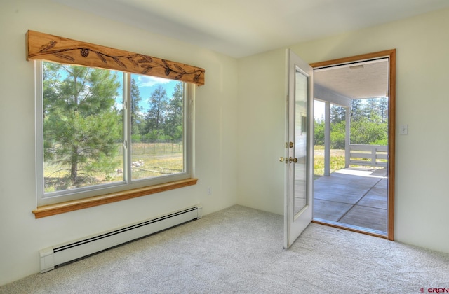 678 N Lakeside Dr, Durango, CO 81303 - spare room with a baseboard heating unit, plenty of natural light, and carpet