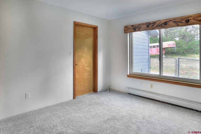 678 N Lakeside Dr, Durango, CO 81303 - empty room with baseboard heating and carpet