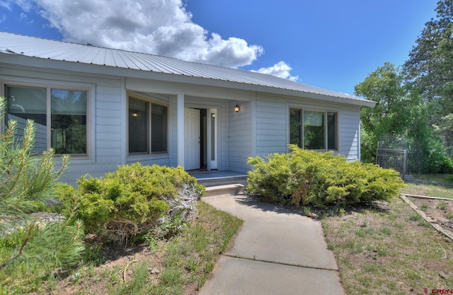 678 N Lakeside Dr, Durango, CO 81303 - view of exterior entry with a metal roof