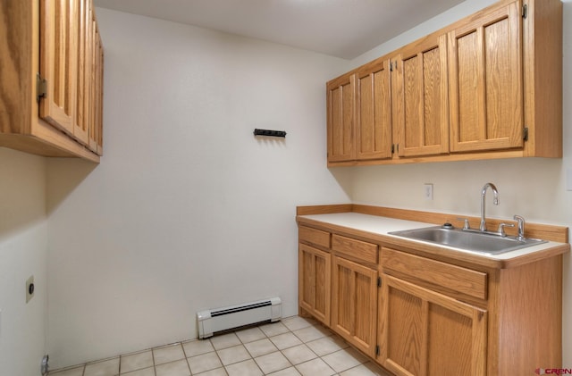 678 N Lakeside Dr, Durango, CO 81303 - kitchen with a baseboard heating unit, light countertops, and light tile patterned floors
