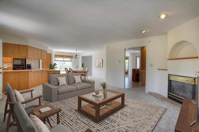 678 N Lakeside Dr, Durango, CO 81303 - living area with light carpet and a brick fireplace