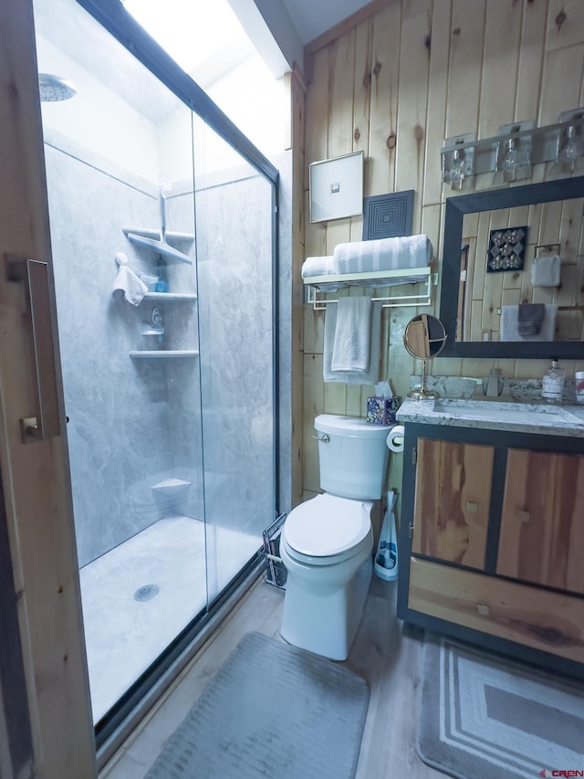27126 Road R, Dolores, CO 81323 - full bath with a shower stall, vanity, and wood finished floors