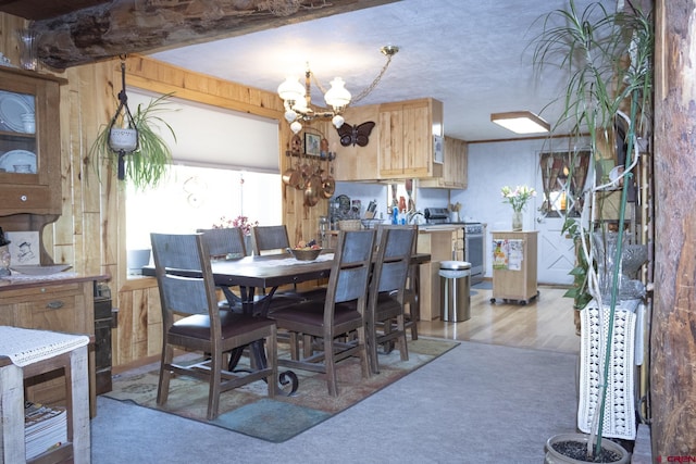 27126 Road R, Dolores, CO 81323 - dining room with a chandelier and light colored carpet