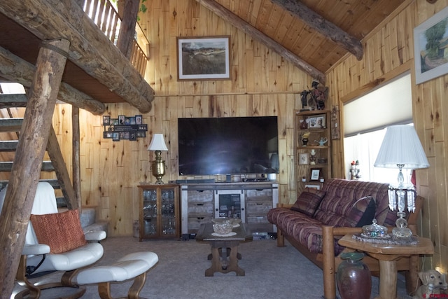 27126 Road R, Dolores, CO 81323 - living room featuring wood walls, a wood ceiling with exposed beams, carpet floors, stairs, and high vaulted ceiling