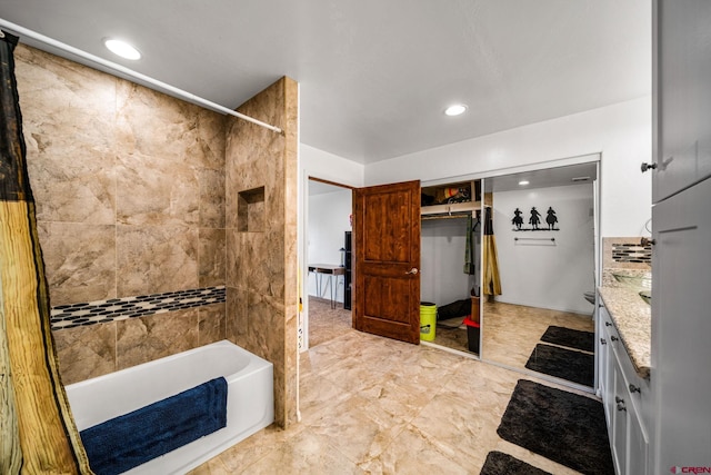 27420 Rd P.2, Dolores, CO 81323 - bathroom featuring vanity, bathing tub / shower combination, and recessed lighting