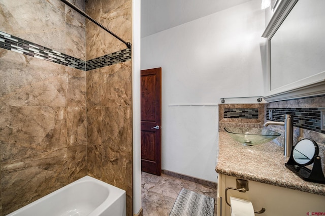 27420 Rd P.2, Dolores, CO 81323 - bathroom with vanity, washtub / shower combination, and tasteful backsplash