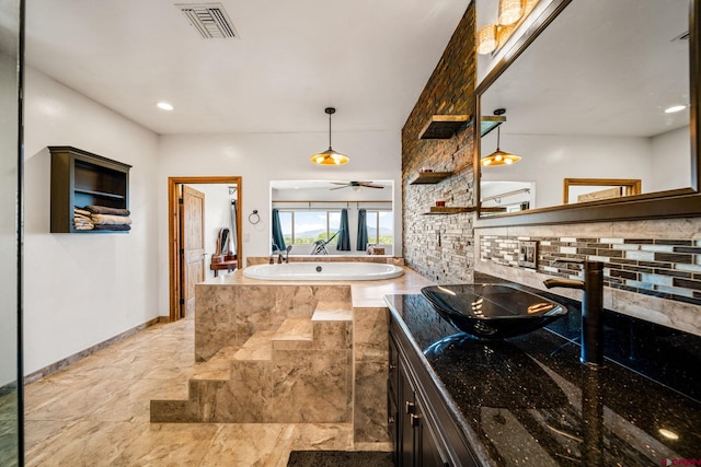 27420 Rd P.2, Dolores, CO 81323 - full bath featuring a bath, vanity, a ceiling fan, and marble finish floors