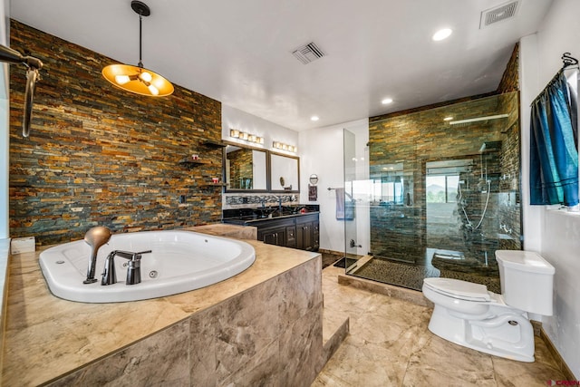 27420 Rd P.2, Dolores, CO 81323 - bathroom featuring a tub with jets, a stall shower, vanity, and recessed lighting