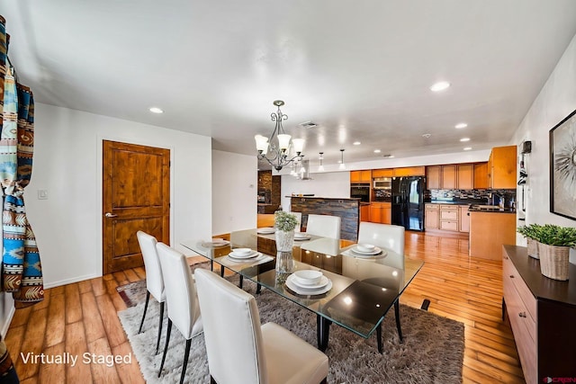 27420 Rd P.2, Dolores, CO 81323 - dining space featuring a chandelier, recessed lighting, and light wood finished floors