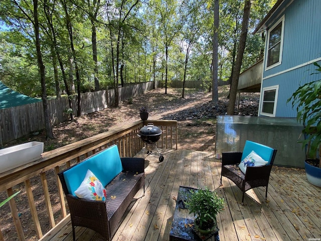 deck featuring a fenced backyard