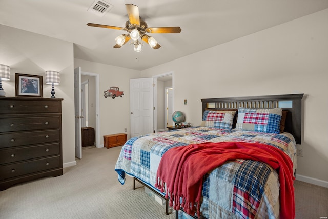 bedroom featuring light carpet, ceiling fan, visible vents, and baseboards