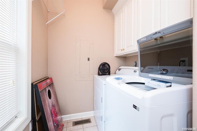 1745 Thornton Ferry Rd, Hot Springs, AR 71913 - washroom featuring cabinet space, visible vents, washer and dryer, tile patterned flooring, and baseboards