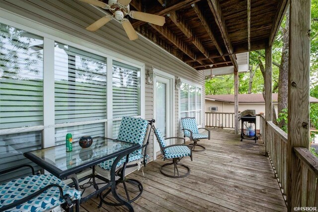1745 Thornton Ferry Rd, Hot Springs, AR 71913 - wooden deck with ceiling fan and outdoor dining area