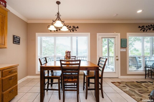1745 Thornton Ferry Rd, Hot Springs, AR 71913 - dining room featuring light tile patterned floors, baseboards, an inviting chandelier, and crown molding