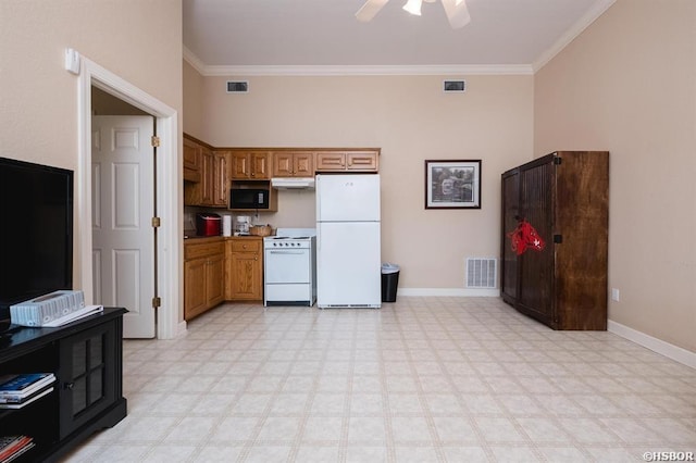 1745 Thornton Ferry Rd, Hot Springs, AR 71913 - kitchen featuring crown molding, light floors, visible vents, and white appliances