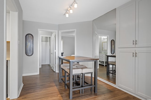 203 Stearns Pt Unit F3, Hot Springs, AR 71913 - dining room with dark wood-style floors and baseboards
