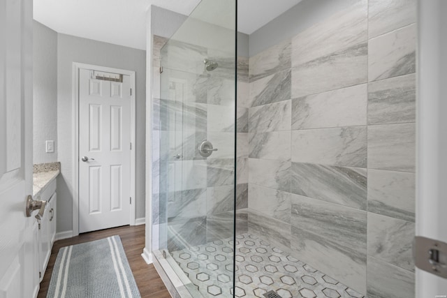 203 Stearns Pt Unit F3, Hot Springs, AR 71913 - full bathroom featuring tiled shower, wood finished floors, and vanity