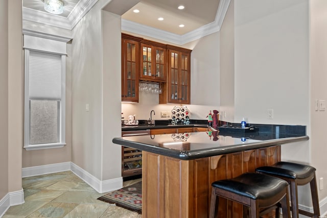 347 Paradise Pt, Hot Springs, AR 71913 - indoor wet bar with crown molding, light stone finish flooring, and recessed lighting