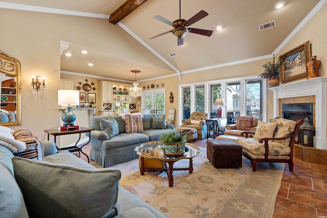 living room featuring ceiling fan with notable chandelier, visible vents, and ornamental molding