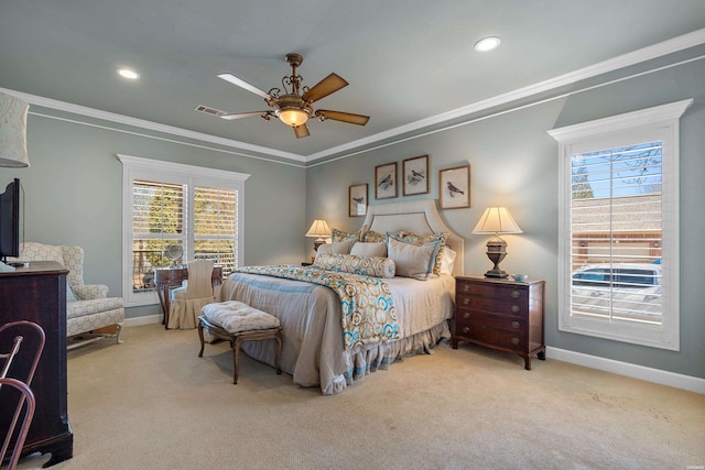 carpeted bedroom with baseboards, multiple windows, and ornamental molding